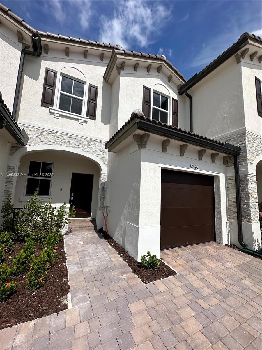 a front view of a house with entryway