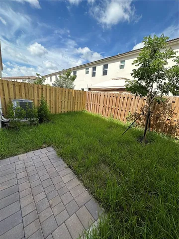 a bathroom with a sink toilet and a mirror