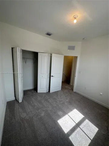 a front view of a house with yard