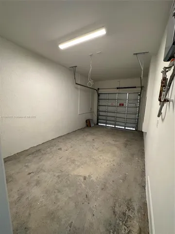 a view of a street with cars