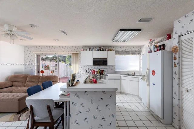 $615,000 | 13950 Oak Ridge Drive, Davie, FL 33325