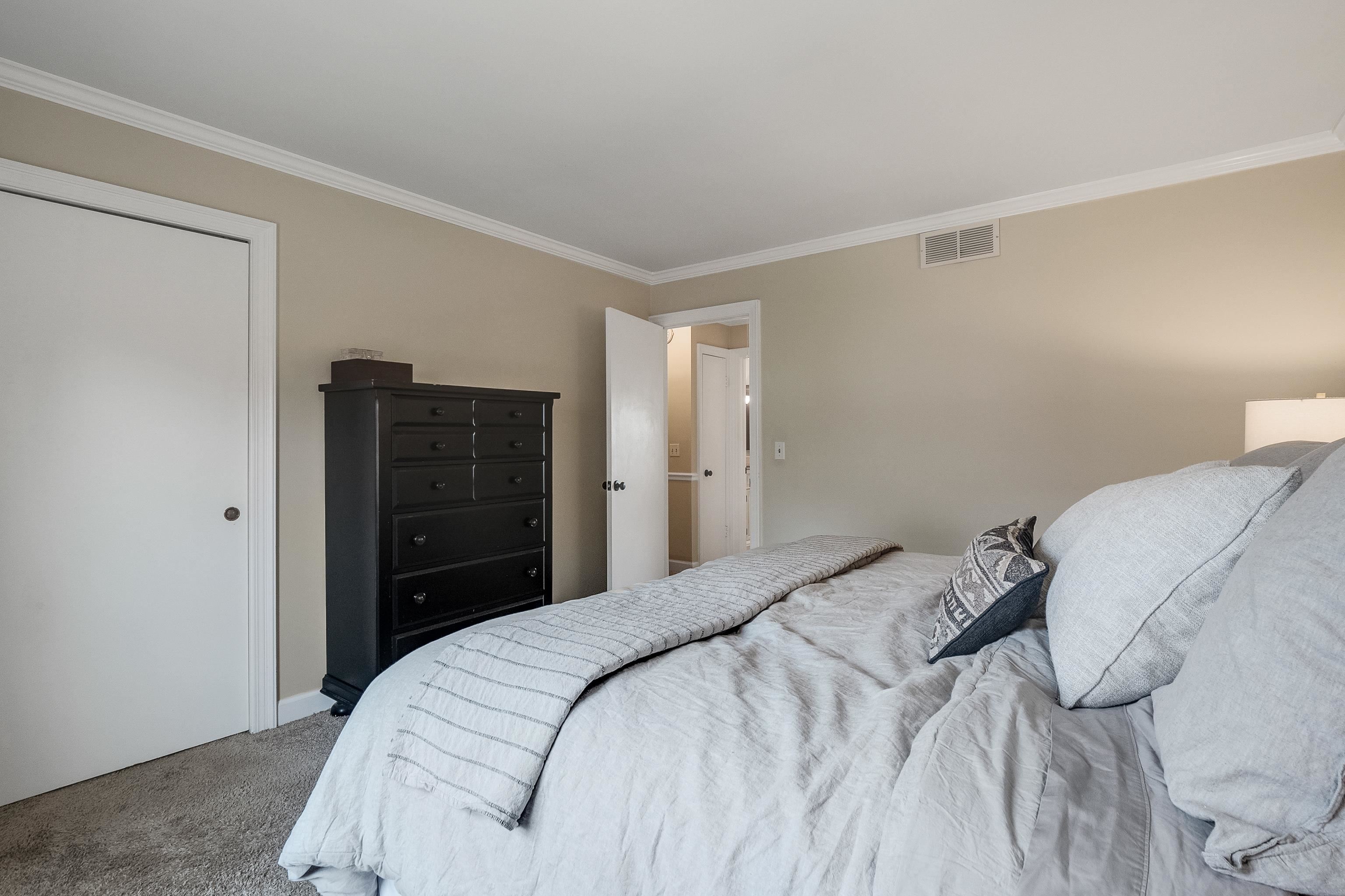 1237 Chamberlain Drive, Unit 1237 Memphis, TN 38119 - Photo 17 of 25 a bedroom with a bed and a closet