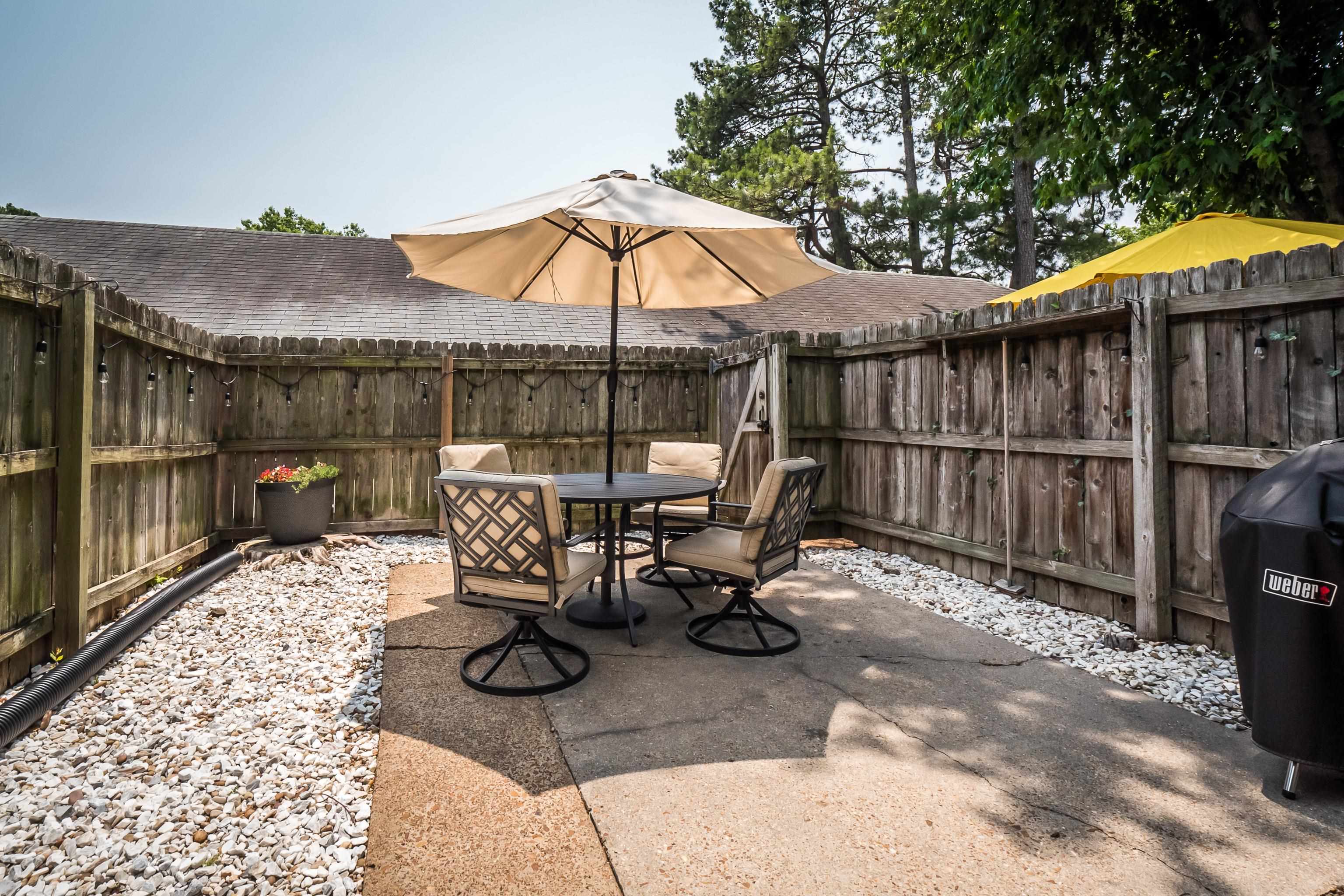 1237 Chamberlain Drive, Unit 1237 Memphis, TN 38119 - Photo 23 of 25 a view of backyard with swimming pool and furniture
