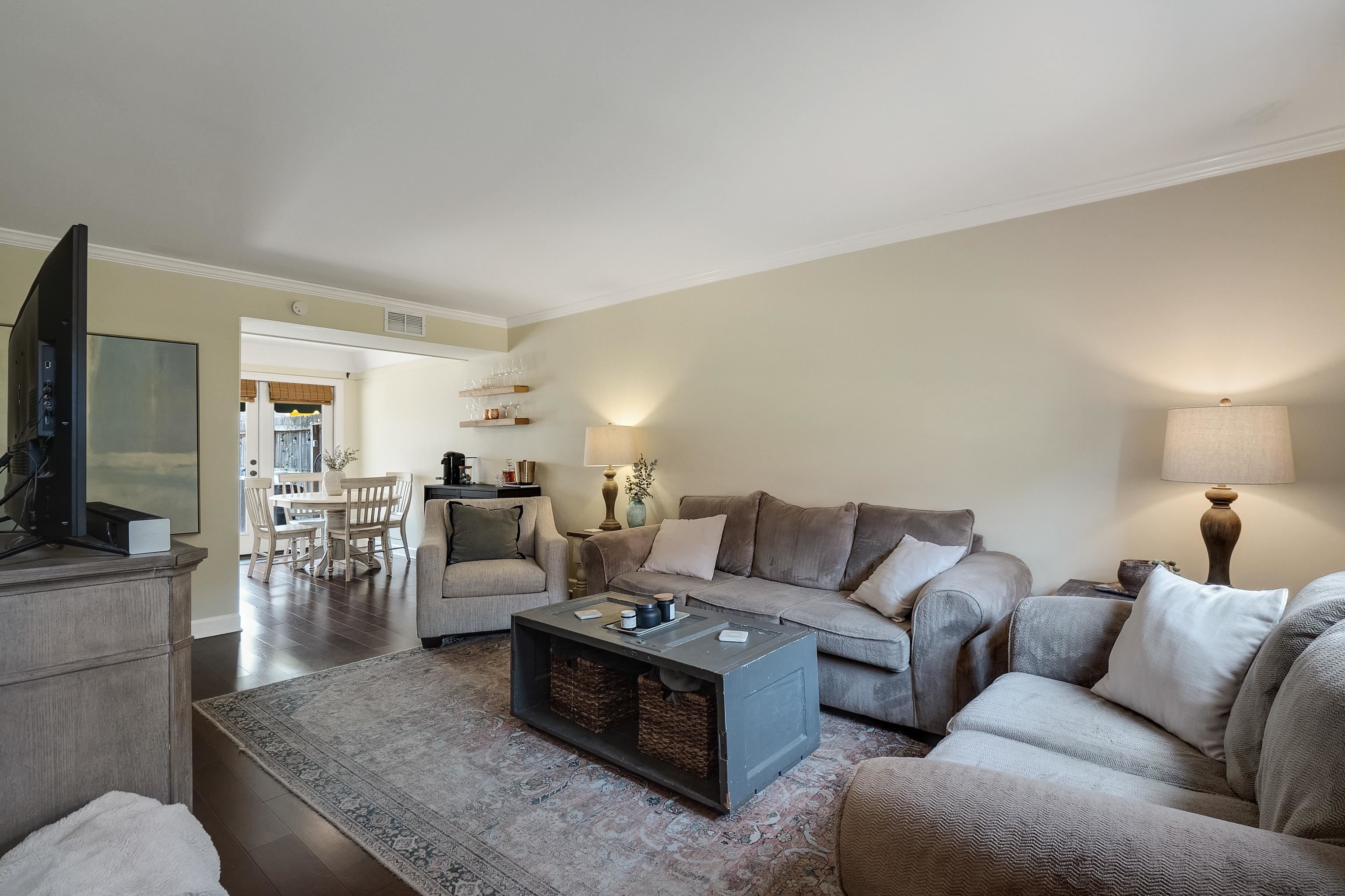 1237 Chamberlain Drive, Unit 1237 Memphis, TN 38119 - Photo 5 of 25 a living room with furniture and a flat screen tv