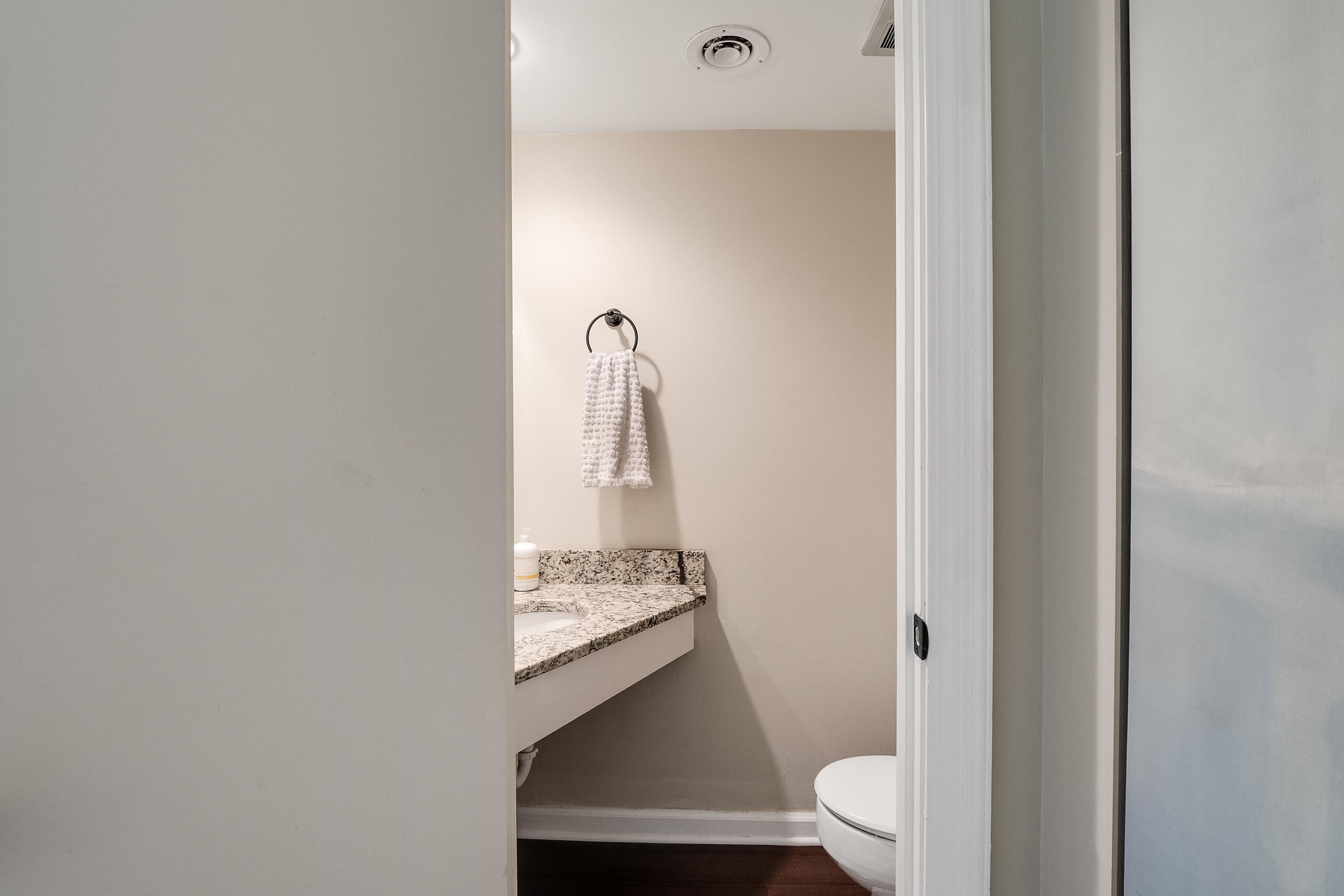 1237 Chamberlain Drive, Unit 1237 Memphis, TN 38119 - Photo 8 of 25 a bathroom with a sink and a toilet