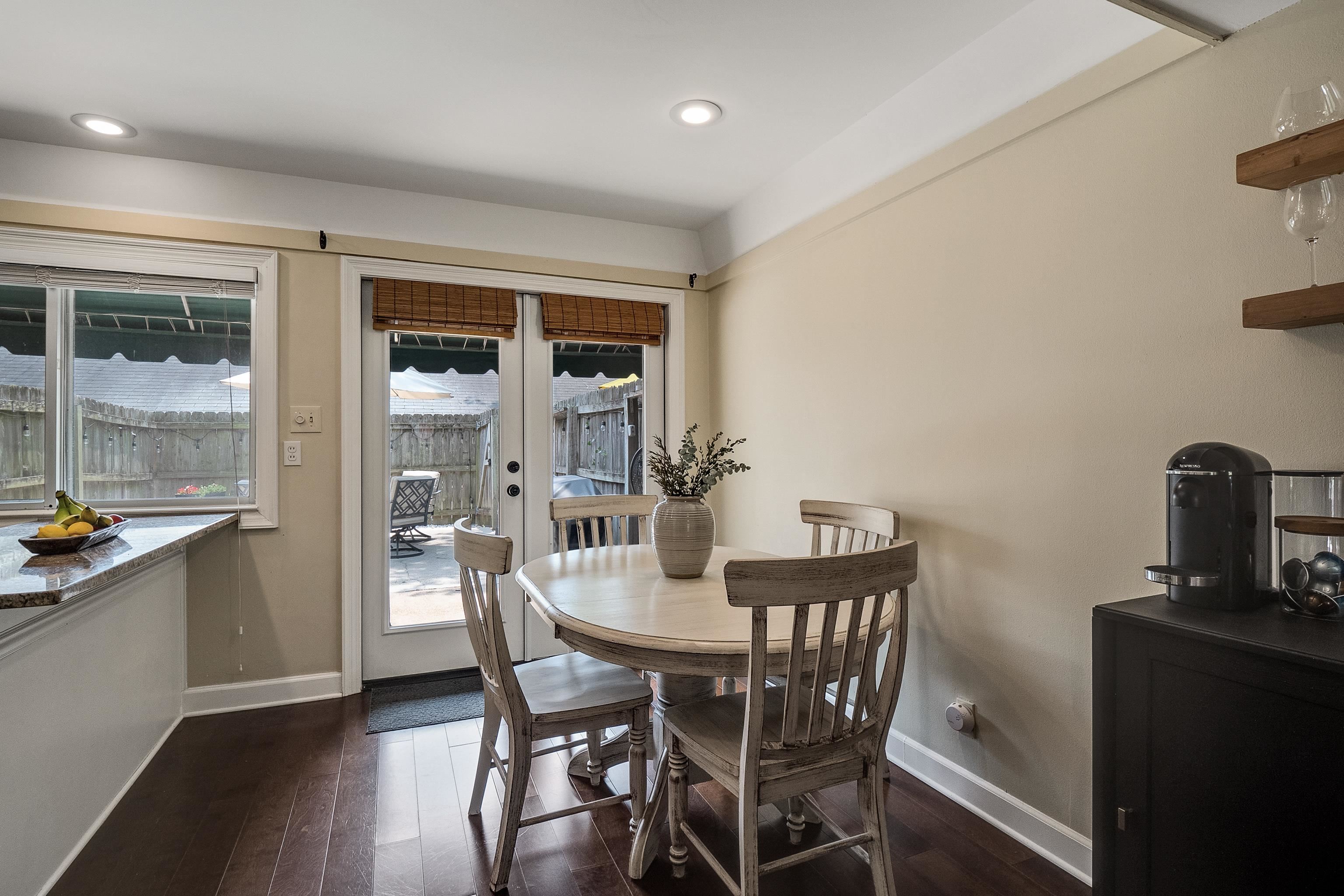 1237 Chamberlain Drive, Unit 1237 Memphis, TN 38119 - Photo 9 of 25 a view of a dining room with furniture and window