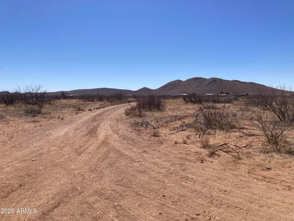 a view of mountains and valleys