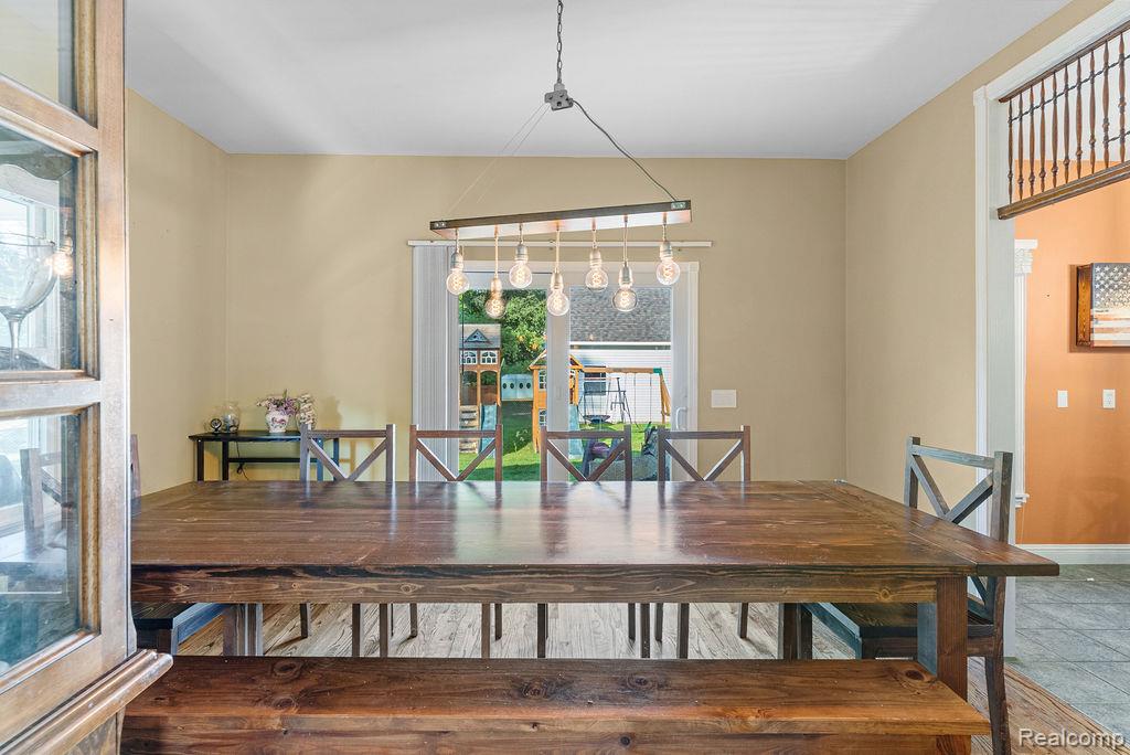 1476 County Farm Road Howell, MI 48843 - Photo 12 of 53 Dining area featuring baseboards