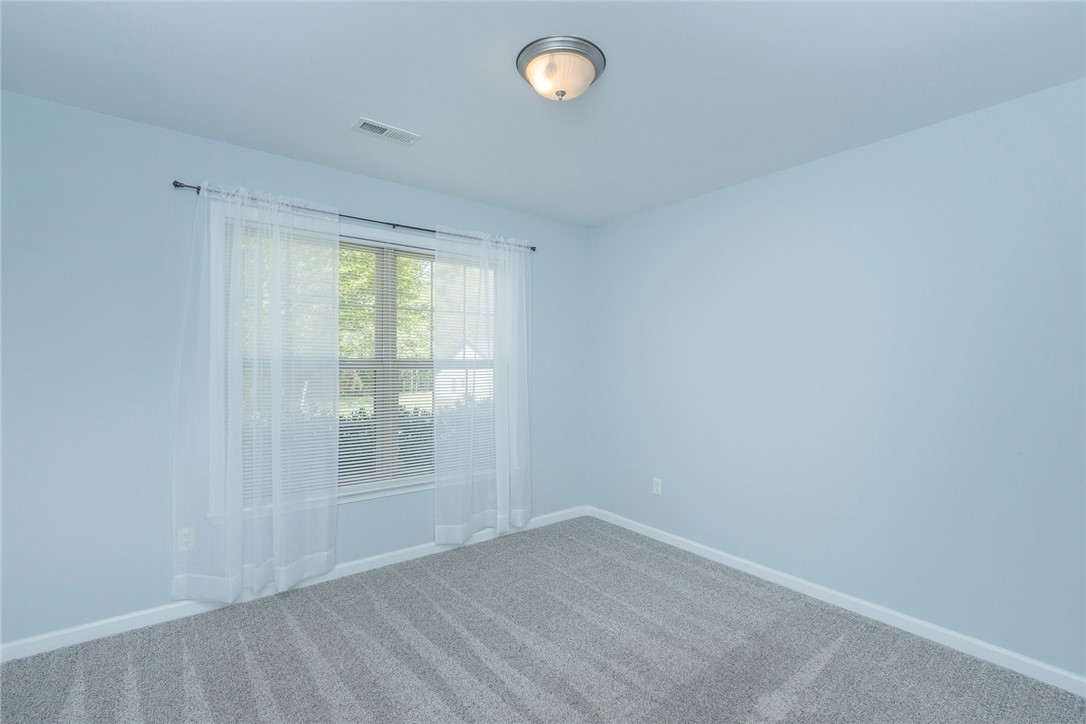 158 Mediterranean Avenue Anderson, SC 29621 - Photo 17 of 39 This spacious room offers comfort and abundant natural light through its large window.