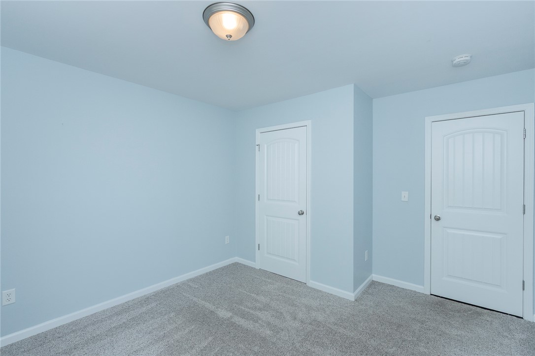 158 Mediterranean Avenue Anderson, SC 29621 - Photo 18 of 39 This spacious bedroom features ample closet space and plush carpeting for comfort.