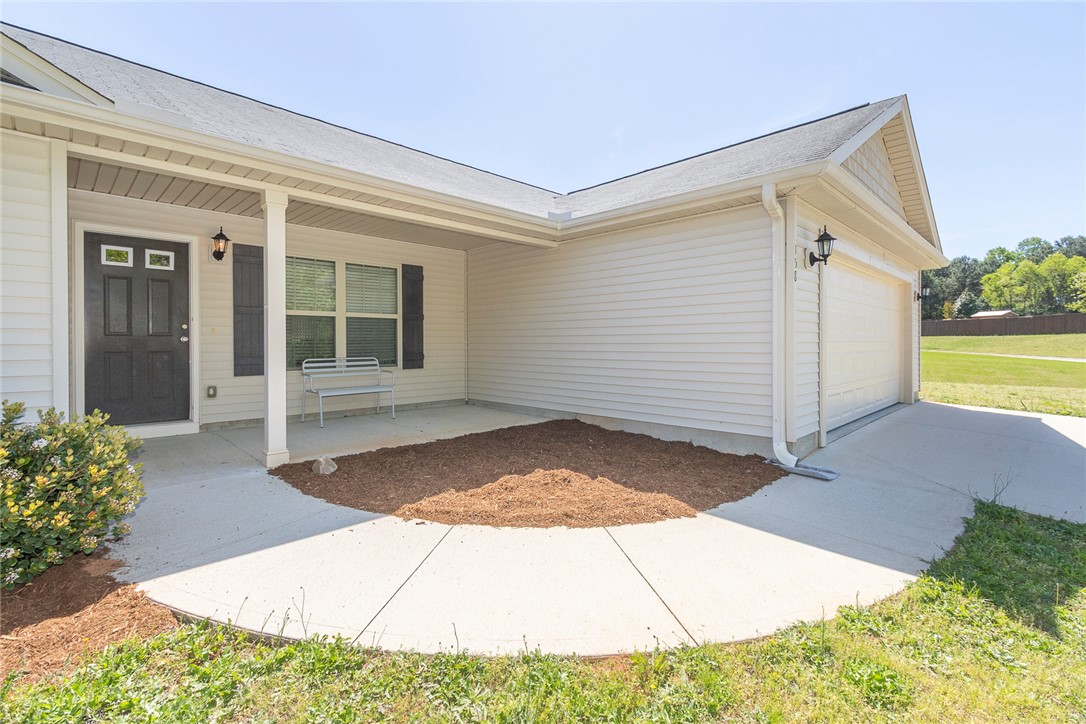 158 Mediterranean Avenue Anderson, SC 29621 - Photo 2 of 39 This charming home offers a welcoming facade with convenient garage access.