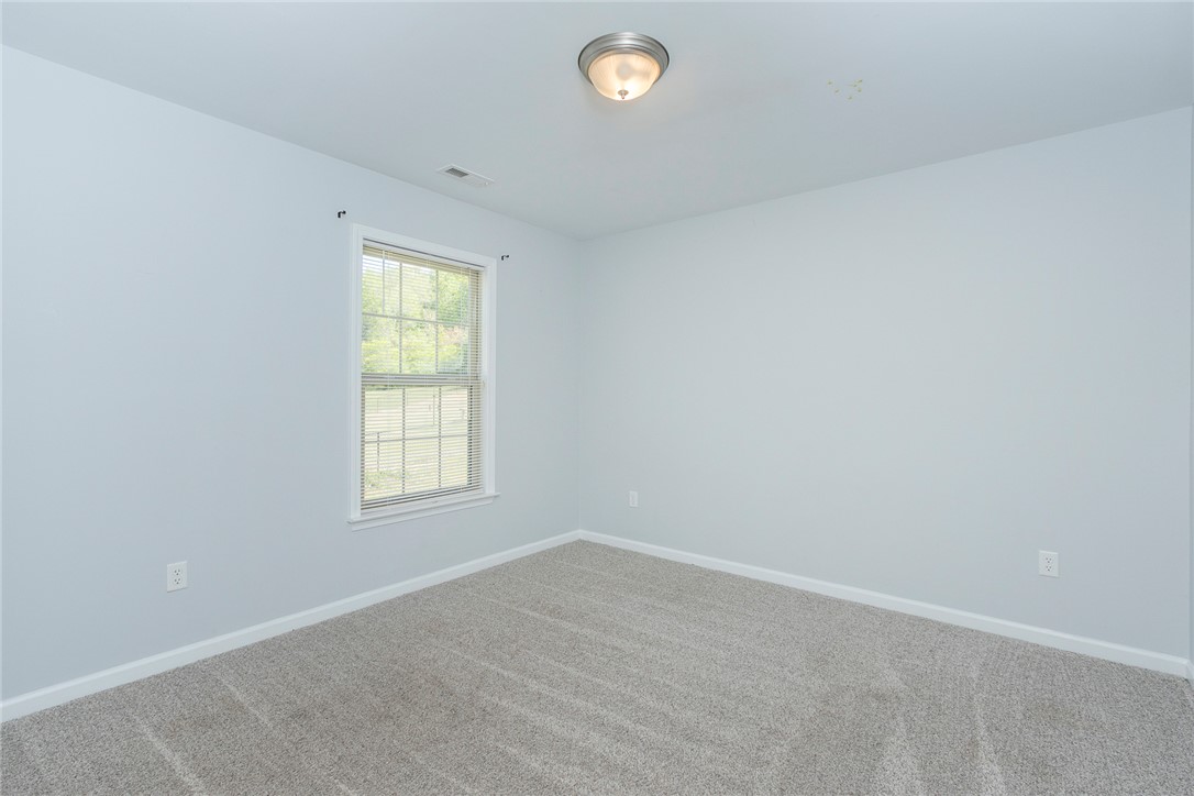158 Mediterranean Avenue Anderson, SC 29621 - Photo 21 of 39 This spacious room provides a blank canvas, offering endless possibilities for personalization.