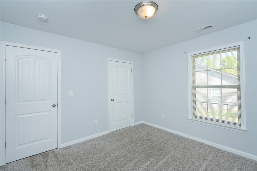 158 Mediterranean Avenue Anderson, SC 29621 - Photo 22 of 39 This bright and airy room offers a comfortable and inviting atmosphere.