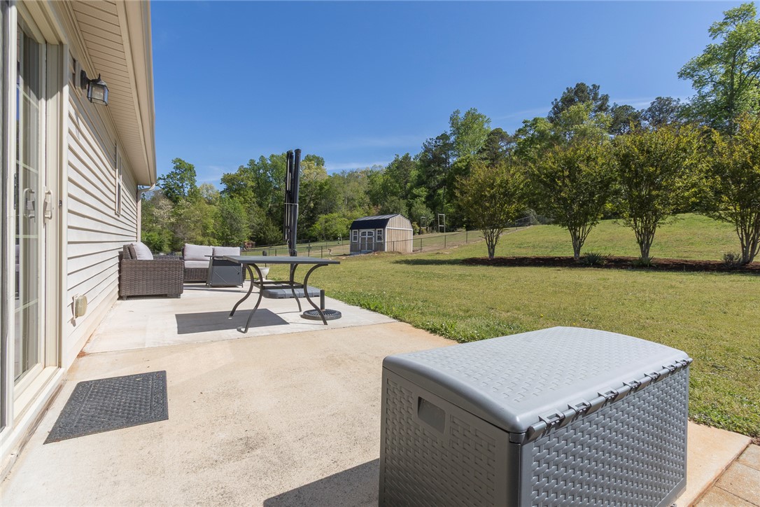 158 Mediterranean Avenue Anderson, SC 29621 - Photo 31 of 39 This tranquil outdoor space offers a private patio, perfect for relaxation and entertaining.