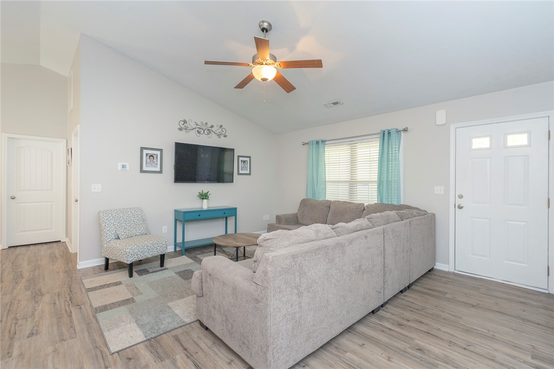158 Mediterranean Avenue Anderson, SC 29621 - Photo 4 of 39 This airy living area offers ample space and comfortable flooring for everyday relaxation.
