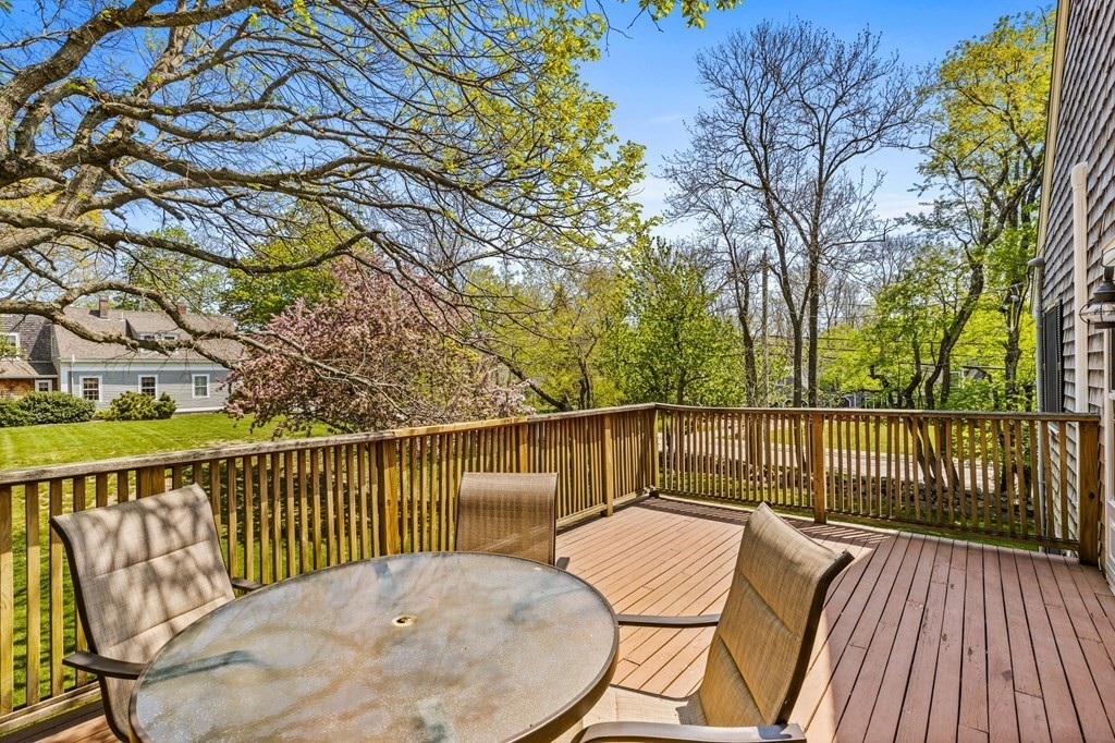 140 Gannett Road Scituate, MA 02066 - Photo 26 of 36 a view of a balcony with wooden floor and fence