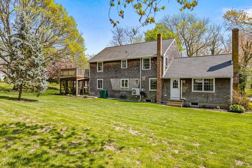 140 Gannett Road Scituate, MA 02066 - Photo 28 of 36 a view of a house with a yard