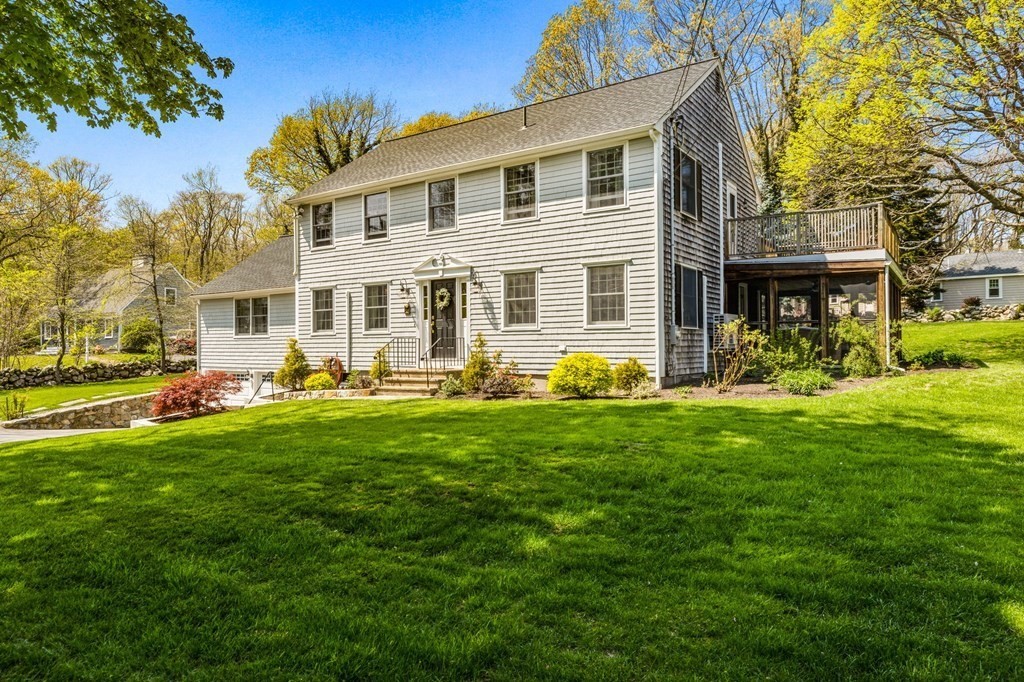 140 Gannett Road Scituate, MA 02066 - Photo 30 of 36 a front view of house with yard and green space
