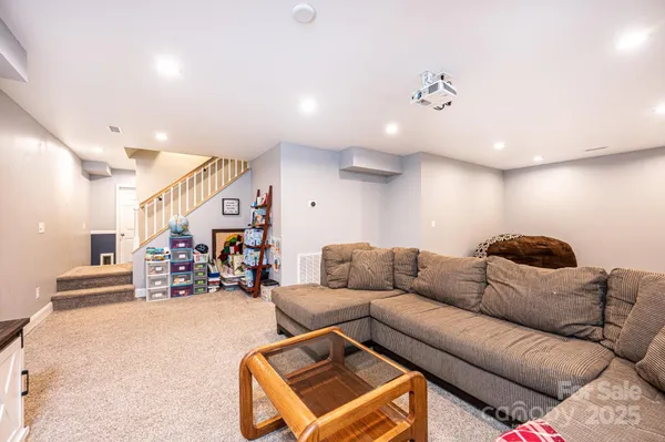 a living room with furniture and a couch