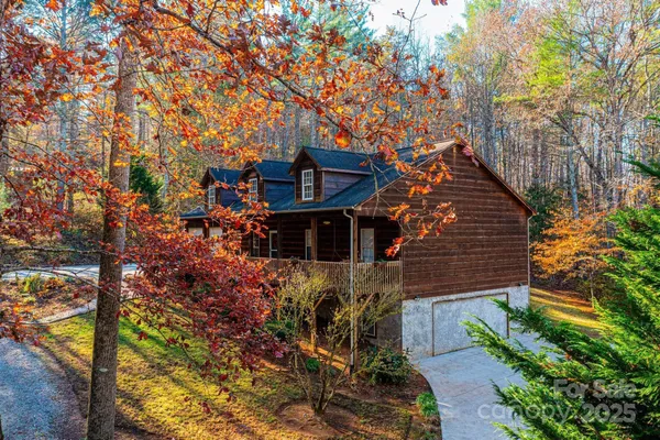 a view of a house with a tree
