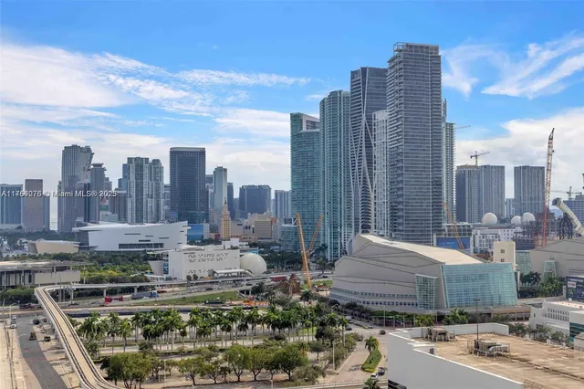 a dining hall with granite countertop a large window