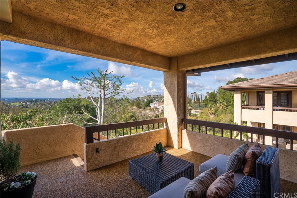 10521 Easter Hill Drive North Tustin, CA 92705 - Photo 14 of 31 Covered patio off Master bedroom and sitting area is a private retreat, with stairs leading to pool area.