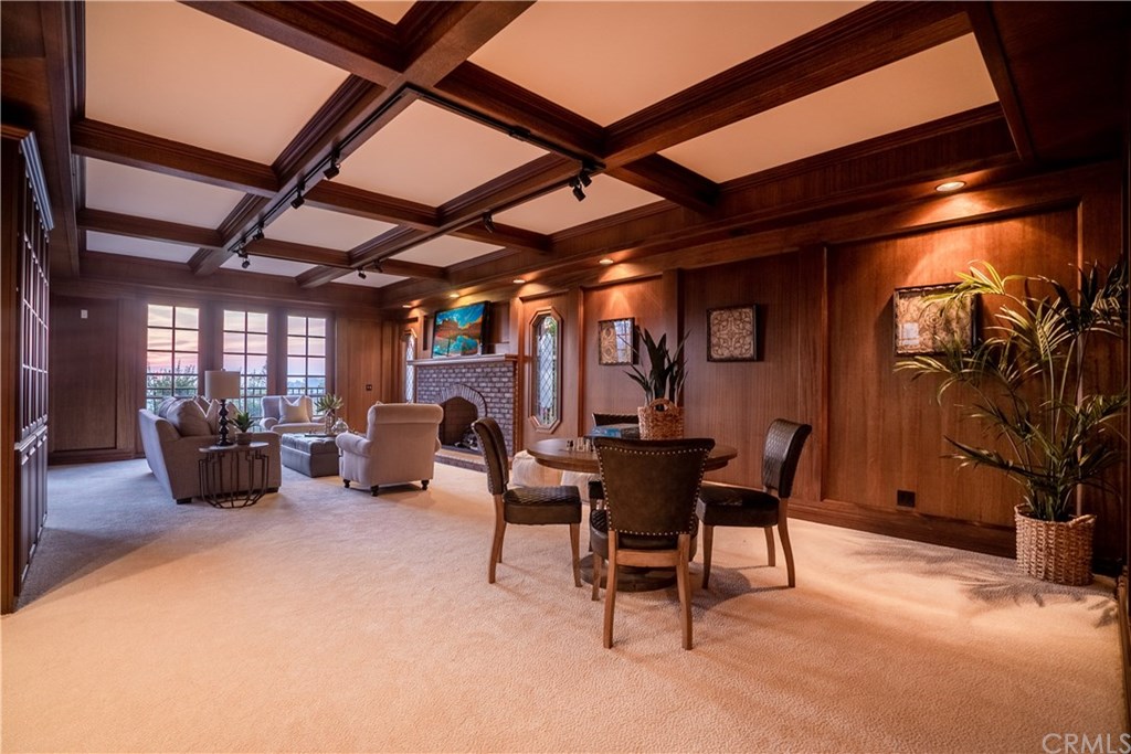 10521 Easter Hill Drive North Tustin, CA 92705 - Photo 18 of 31 Downstairs is a massive Family Room with beautiful view and a 3/4 bath. Spacious walk behind bar area (not pictured) can be converted to 5th downstairs bedroom if needed. Family Room has 2 sets of French Doors that open to large patio areas. Don't miss additional flat yard area located behind paneled wall in picture.
Seller called it her Secret Garden. You can use your imagination!