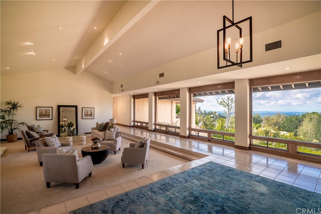 10521 Easter Hill Drive North Tustin, CA 92705 - Photo 3 of 31 Impressive! Great Room with large fireplace and views to Catalina. One story living with exceptional views .
There are only 2 rooms downstairs.