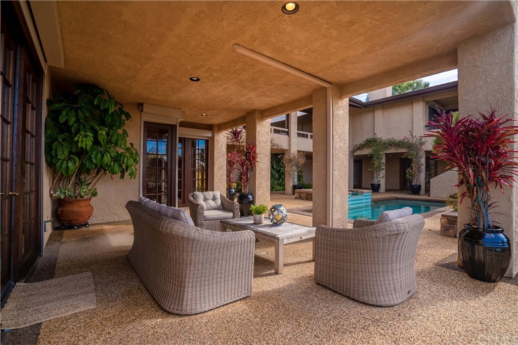 10521 Easter Hill Drive North Tustin, CA 92705 - Photo 21 of 31 Family room patio area off pool, has incredible views when pictured from the reverse angle.