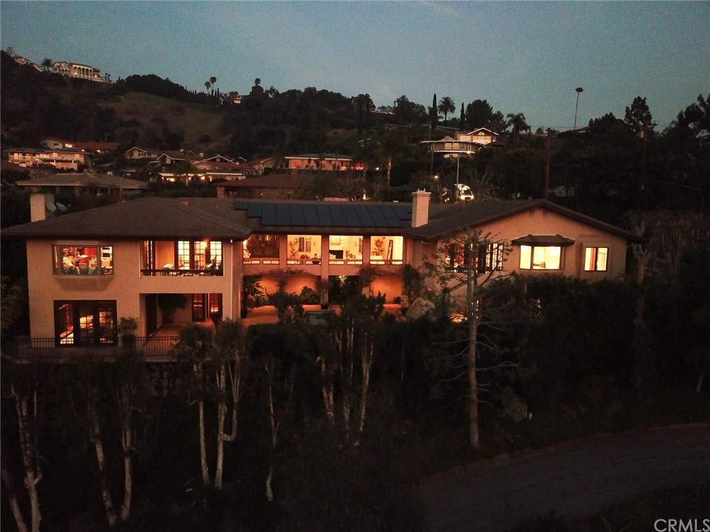10521 Easter Hill Drive North Tustin, CA 92705 - Photo 23 of 31 Rear exterior exemplifies how wonderful this home is for entertaining with mostly unobstructed views of City lights from the interior of the home. Surrounded by large estates yet very private.
