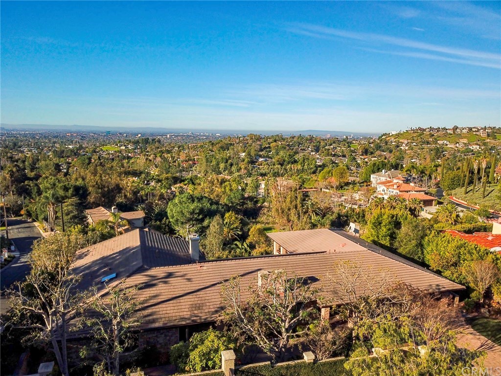 10521 Easter Hill Drive North Tustin, CA 92705 - Photo 5 of 31 View Over this mostly single story home. Backside of home has Solar panels that are owned, not leased.