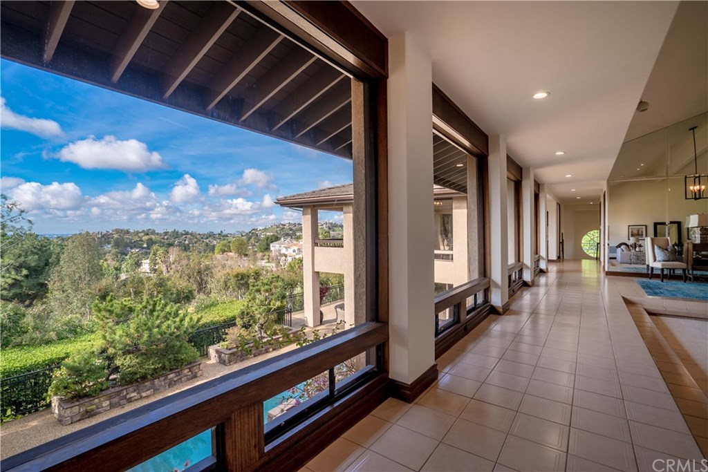 10521 Easter Hill Drive North Tustin, CA 92705 - Photo 7 of 31 Large glass windows accentuate the 180 degree view from this home.