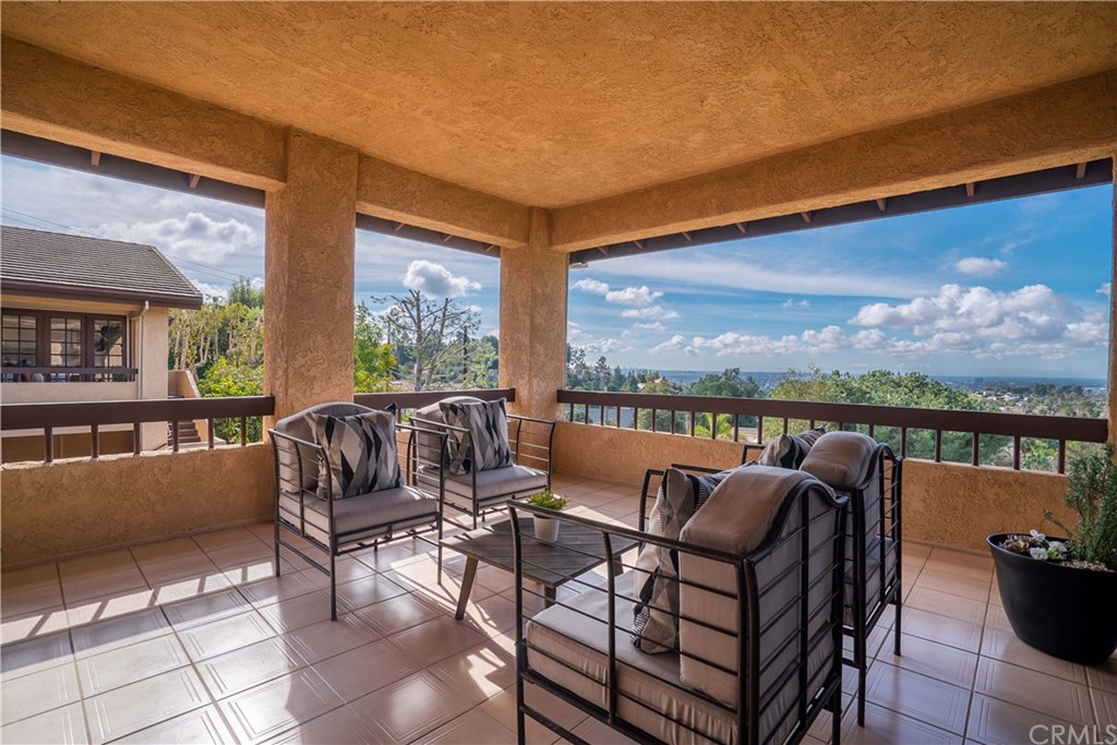 10521 Easter Hill Drive North Tustin, CA 92705 - Photo 9 of 31 Covered Terrace Dining Room and Informal Dining Area in Kitchen. There are also doors leading from kitchen to
this Terrace. Pictured to left in background is the Master Bedroom Terrace with stairs leading to Pool and Spa
