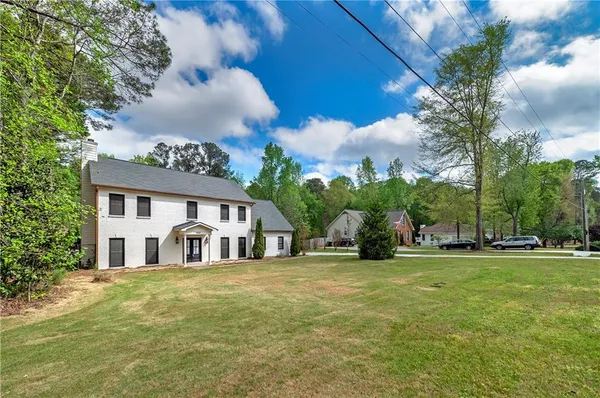 a view of entryway with wooden floor