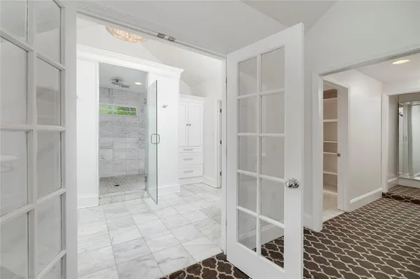 a en suite bathroom with a sink and mirror