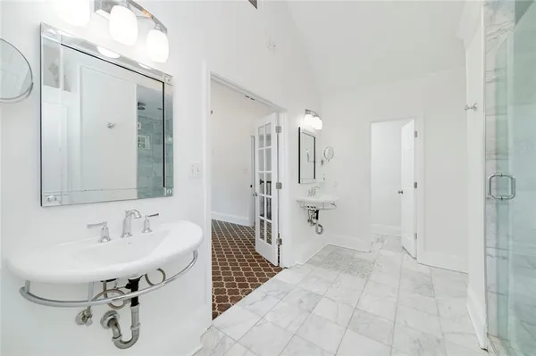 a room view with a closet and a mirror