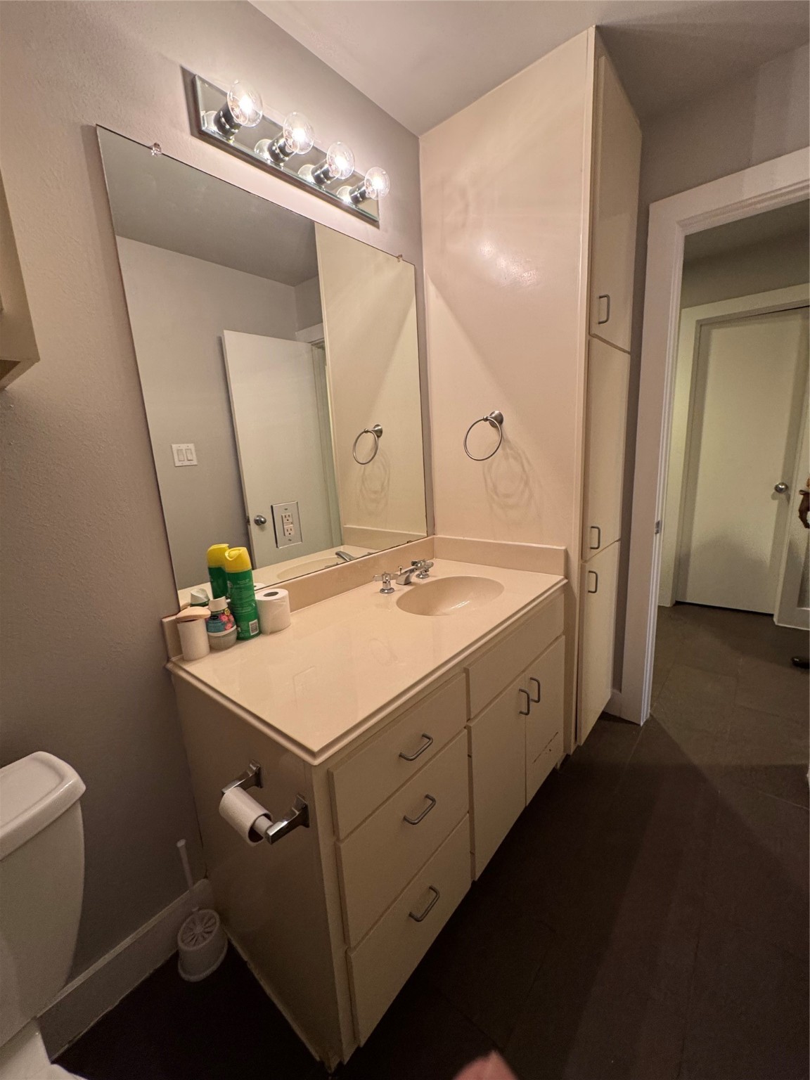 3606 Omeara Drive Houston, TX 77025 - Photo 20 of 21 a bathroom with a sink and a mirror