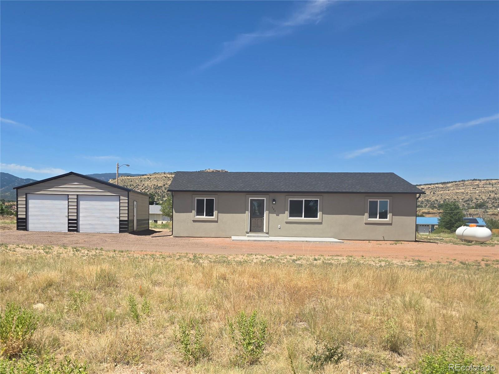 a house view with a outdoor space