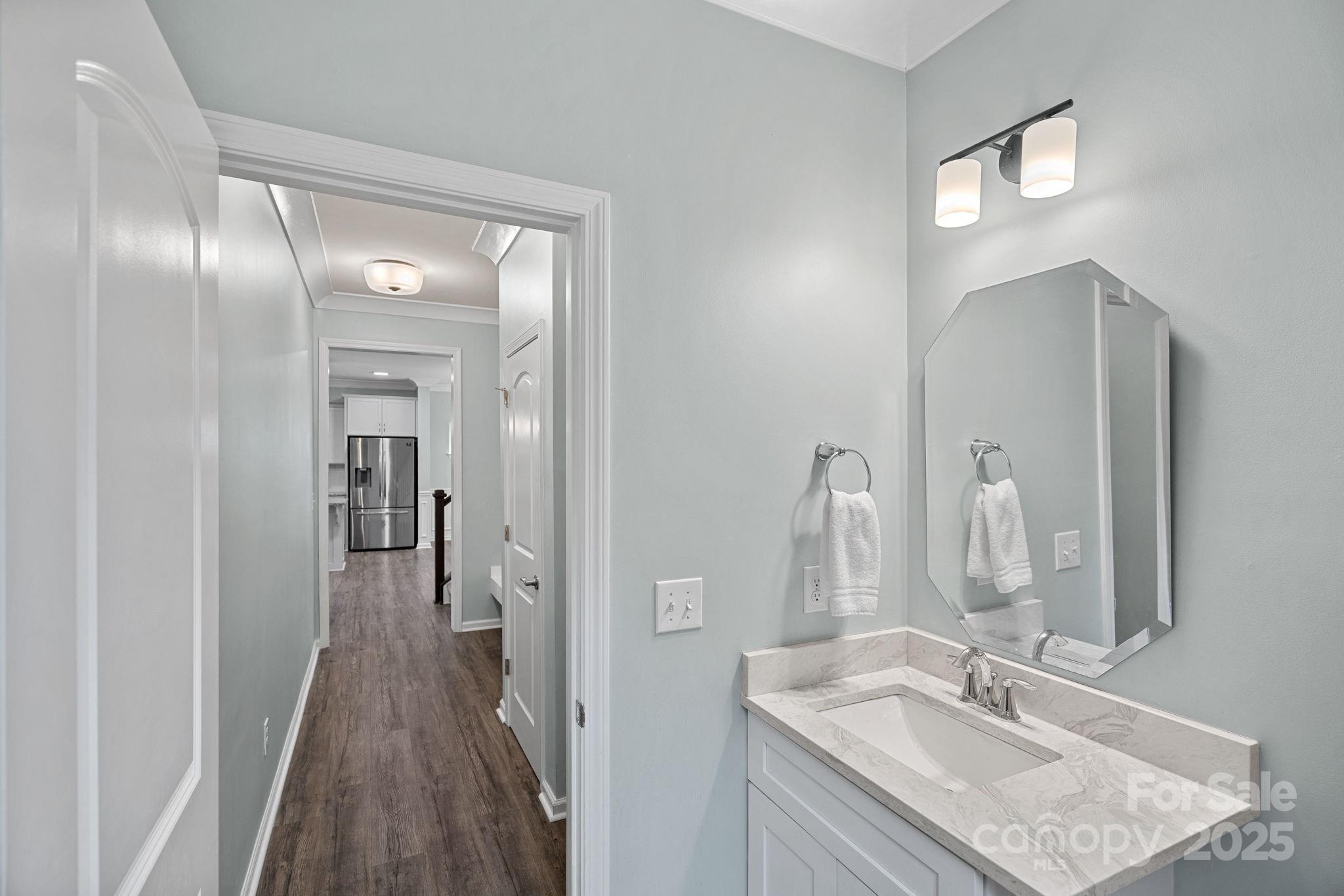 4780 Selhurst Drive Fort Mill, SC 29707 - Photo 13 of 34 a en suite bathroom with a granite countertop sink and a mirror