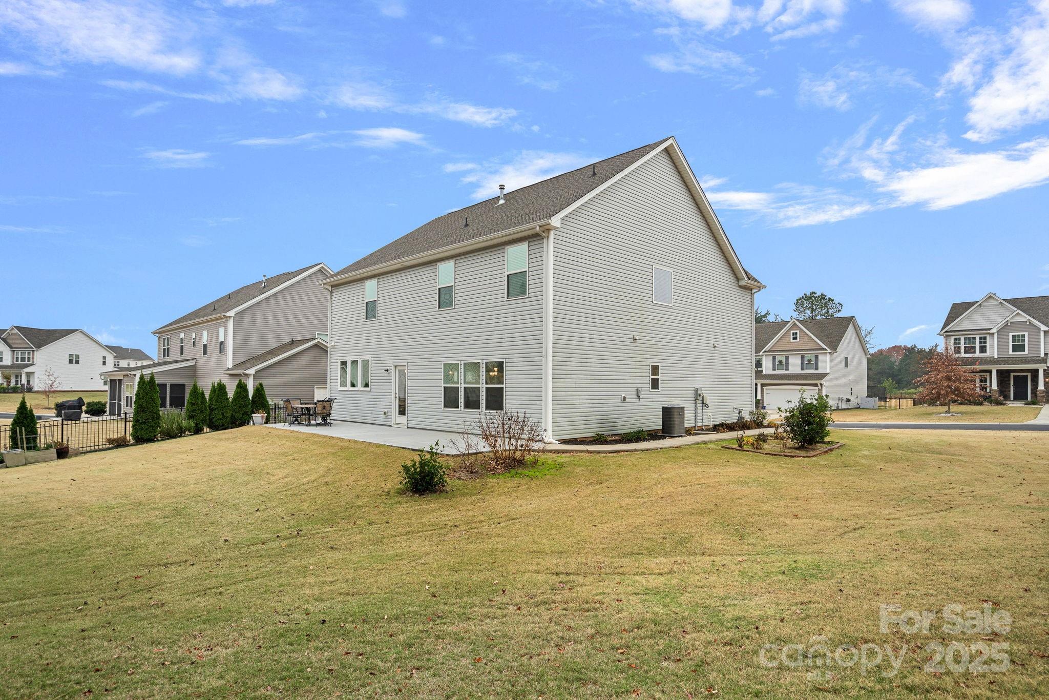 4780 Selhurst Drive Fort Mill, SC 29707 - Photo 26 of 34 a view of a house with a yard