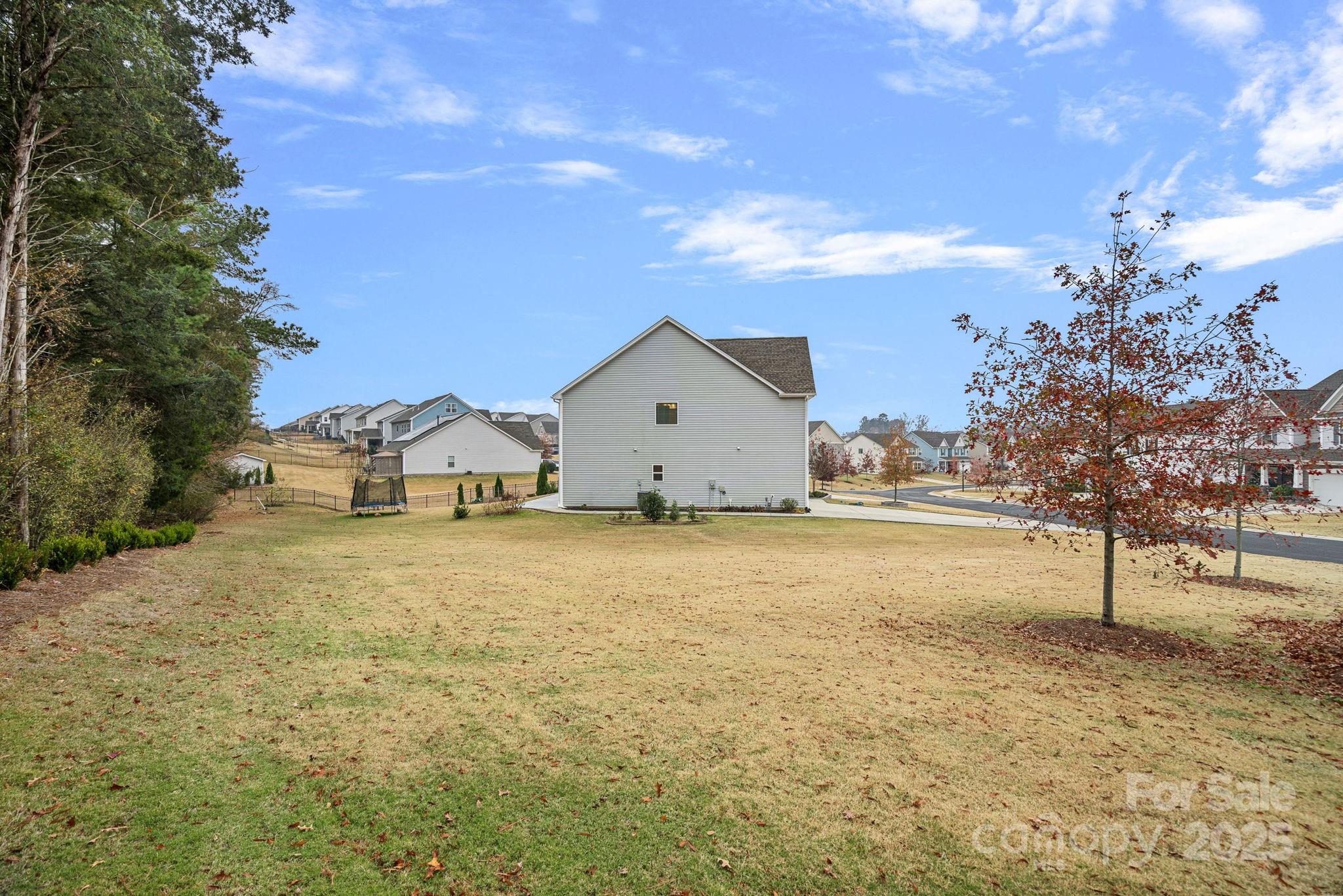 4780 Selhurst Drive Fort Mill, SC 29707 - Photo 27 of 34 a house view with a garden space