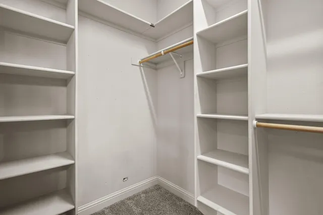 a view of an empty walk in closet