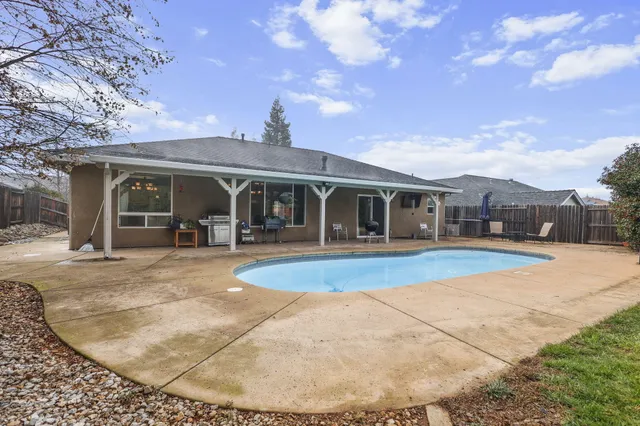 front view of a house with a patio