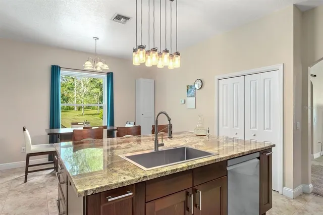a living room filled with furniture and a rug