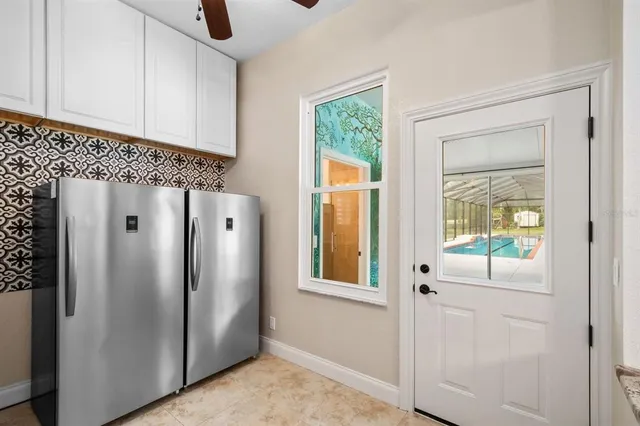 a bathroom with a shower and a sink