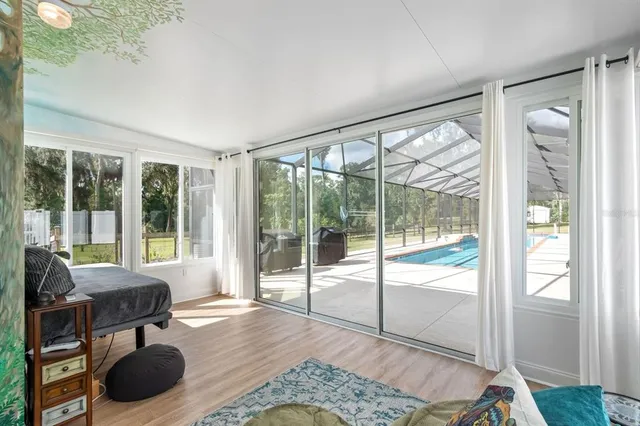 a view of a patio with a table and chairs