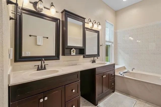 a view of a livingroom with furniture and a flat screen tv