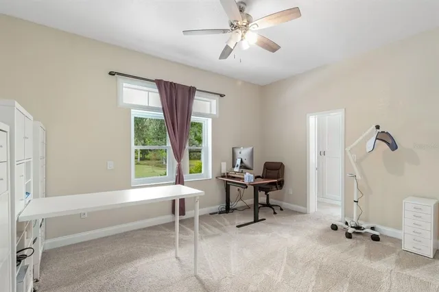 a room with gym equipment and a large mirror