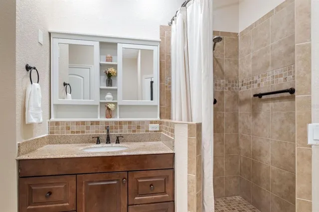 a view of a backyard of the house