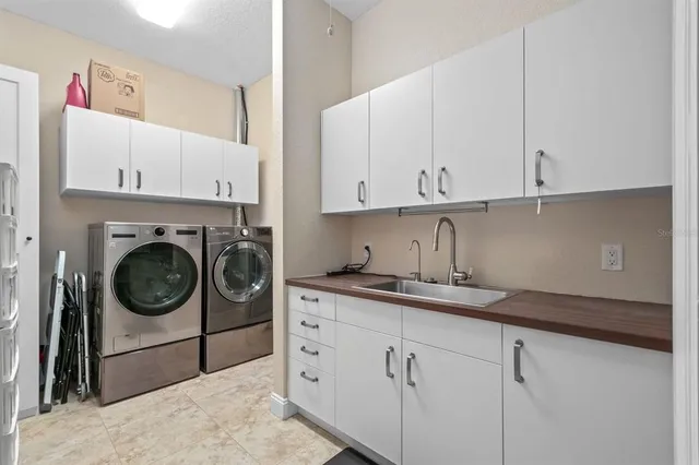 a view of a forest with a houses